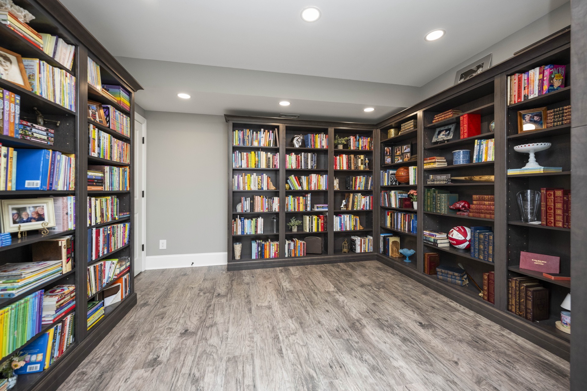 Floor-to-ceiling library built-ins in the Locust Creek basement