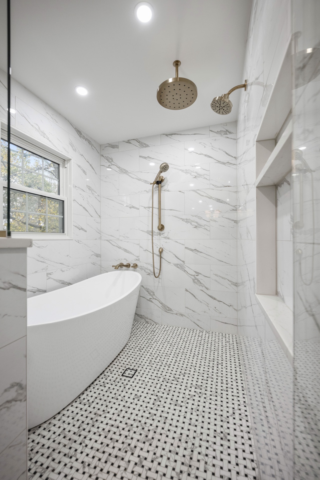 Wet-room shower and freestanding tub at Deer Lake