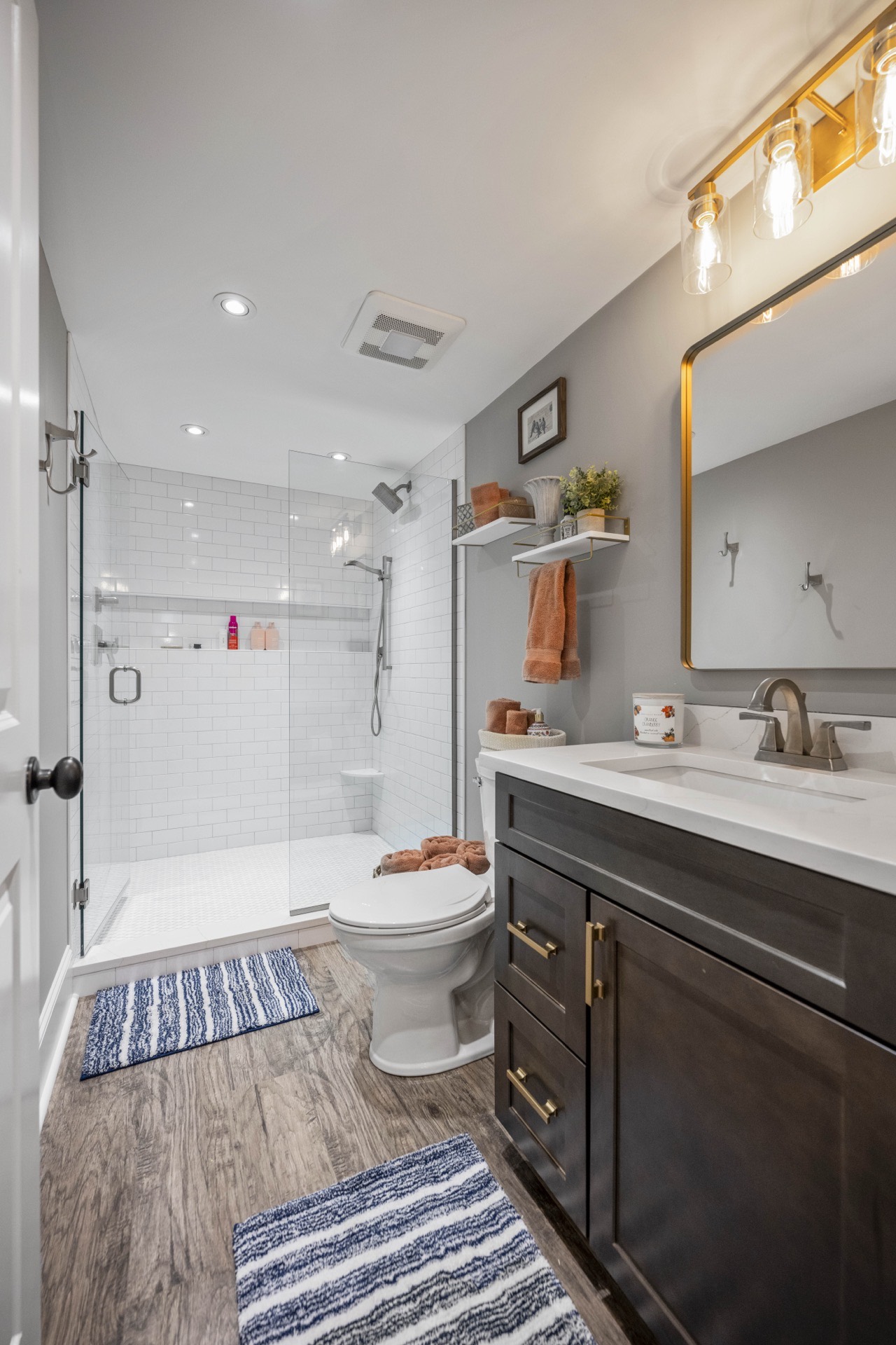 Vanity and brass accents in the Locust Creek bath