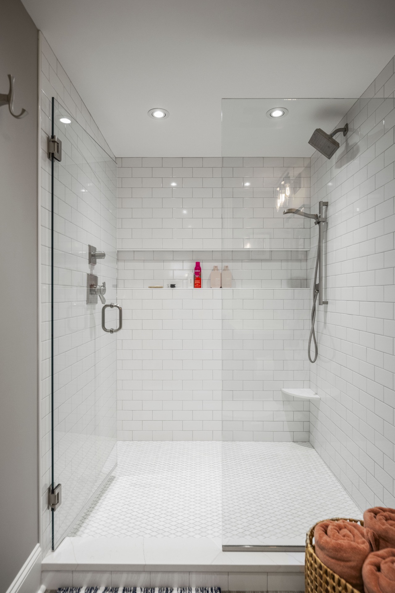 Glass shower with hex floor tile at Locust Creek