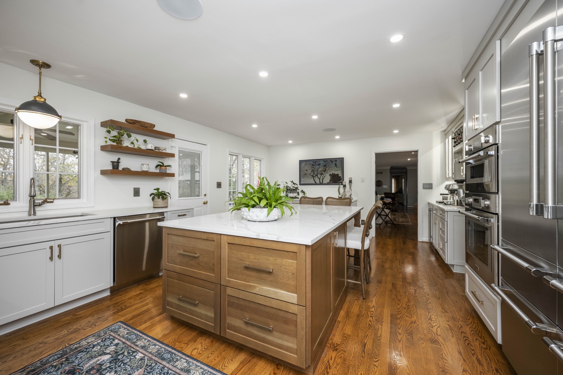 A custom Kentucky kitchen with inset cabinetry and a honed marble island