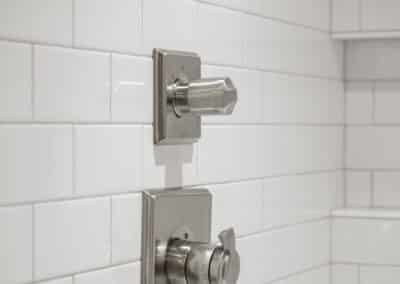 Cozy Retreat Basement Renovation - bathroom fixtures